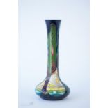 A Moorcroft bud vase, dated to the base 2005, monogrammed HAJ, 20½cm high.