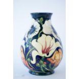 A Moorcroft Miss Alice vase, dated 2005 to the base, by Emma Bossons, 20cm high.