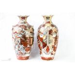 A pair of Japanese vases, decorated with warriors.