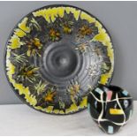 A Studio pottery plate; Poteric Peligrobine, and a retro vase.