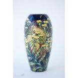 A Moorcroft vase, signed and dated to the base, '99 WM