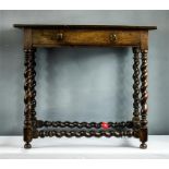 An early 18th century oak side table with barleytwist legs and stretchers, 70 by 50 by 56cm.