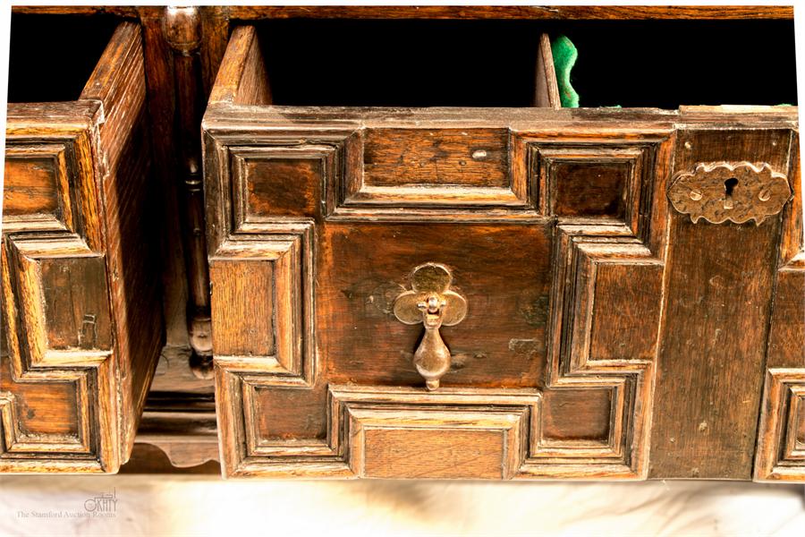 A 17th century and later dresser base with geometric moulded drawers, turned legs and peripheral - Image 3 of 3