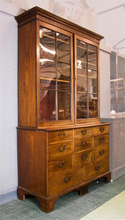 A Chippendale period mahogany bookcase, with astrigal glazed doors enclosing height adjustable
