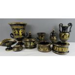 A quantity of Greek black glazed and gilt overlay ceramics to include and urn, vases, coffee can and