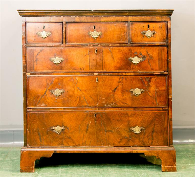 An early 18th century chest of drawers, with three short over three long graduated drawers