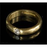 An 18ct gold and solitaire diamond ring, 5.5g.