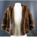 A mink jacket with silk lining.