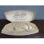 A pearl double strand necklace, Century Pearls Simulated James Walker Goldsmith and Silversmith Ltd.