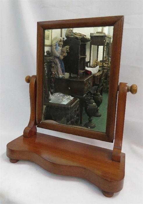 A Victorian mahogany toilet mirror.