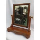 A Victorian mahogany toilet mirror.