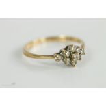 A 9ct gold and diamond ring, size M, 1.3g.