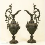 A pair of 19th century bronze ewers.