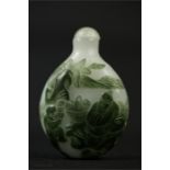 A Chinese scent bottle, green overlay decoration.