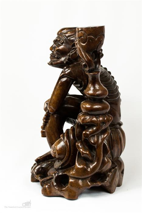 A Chinese carving of a seated man. - Image 2 of 2