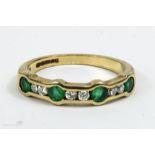 A 9ct gold, emerald and diamond ring.