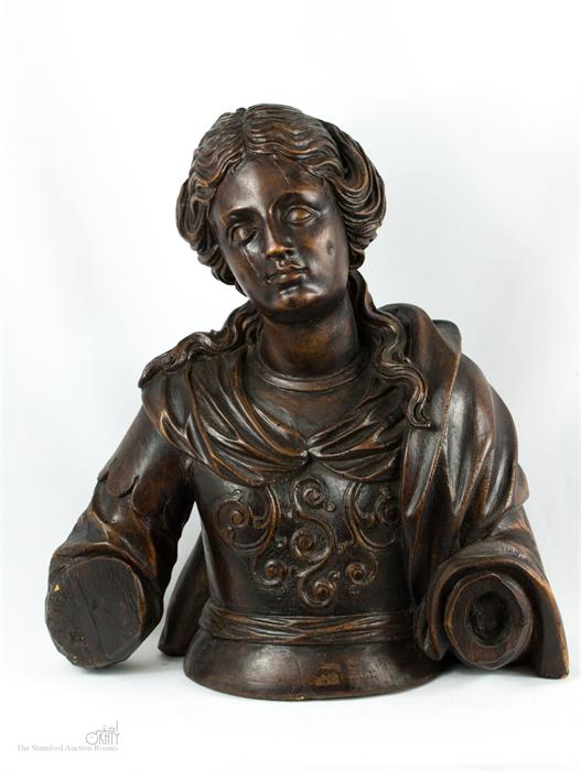 An 18th century bust of a female saint, 46 by 42cm