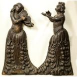 A pair of 18th century baroque carved figures, female figures, one playing a violin.
