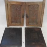 Four carved oak antique panels.