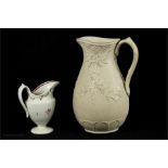 A 19th century Newhall type jug and a stoneware jug.