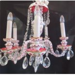 A 1950s coloured glass chandelier, white and cranberry.