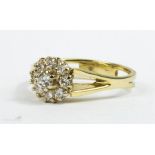 An 18ct gold and diamond cluster ring.