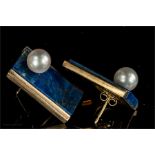 An Art Deco style pair of lapiz lazuli and pearl earrings in an unmarked gold setting, 11.9g in