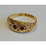 An 18ct gold ring with pink rubies and diamonds, 1.8g.