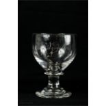 An early Georgian glass rummer, engraved with owners name J. Norfolk, pedestal stem.