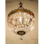 A near pair of chandeliers, with graduated cut glass drops. both approx 19cm by 20cm wide.