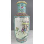 A Chinese enamelled vase, with green ground enhanced with peonies, and having figural panels, 47cm