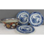 Three blue and white Chinese plates together with a Chinese footed bowl.