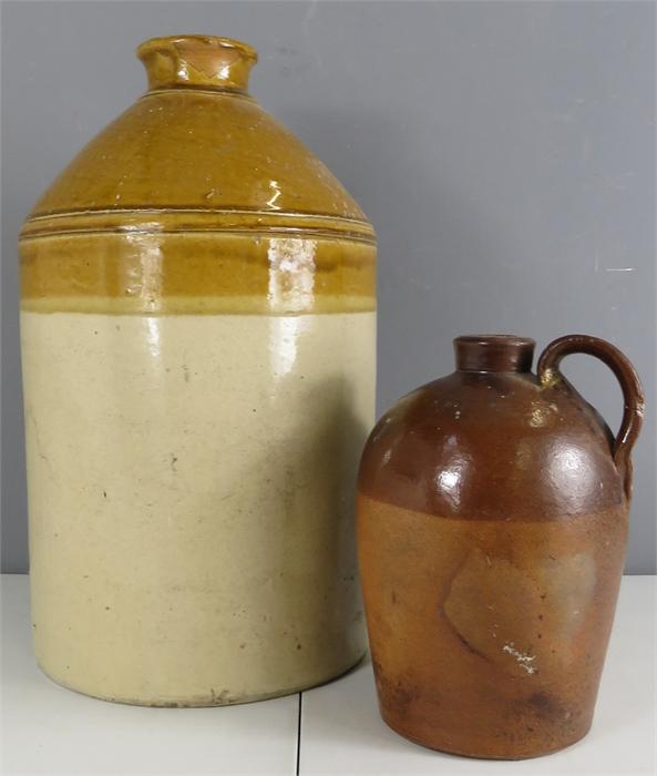 Two stoneware glazed jars.