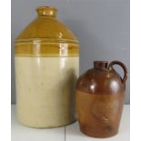 Two stoneware glazed jars.