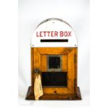 An oak country house letter box.