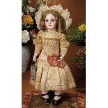French Bisque Bebe by Leon Casimir Bru with Original Costume and Signed Bru Shoes 17,000/25,000
