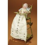 German All-Bisque Baby in Painted Tin High-Chair 300/500