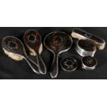 Four piece silver and tortoiseshell piqué work dressing table set, an oval ring box, maker William