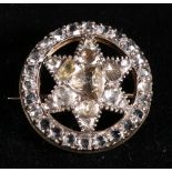 19th Century diamond star brooch, set with rose cut diamonds, 2.5cm. CONDITION REPORT: Central stone