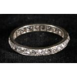 Diamond eternity ring, set with circular old cut brilliant diamonds, unmarked. CONDITION REPORT: