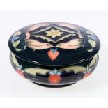 Moorcroft Strawberry Thief pattern jar and cover, impressed and 1995 painted marks, 5cm x 12cm.
