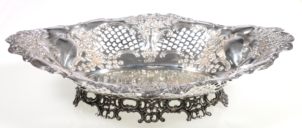 Victorian oval silver pierced bowl, embossed with flowers and c-scrolls, London, 1899, 407g, 30.