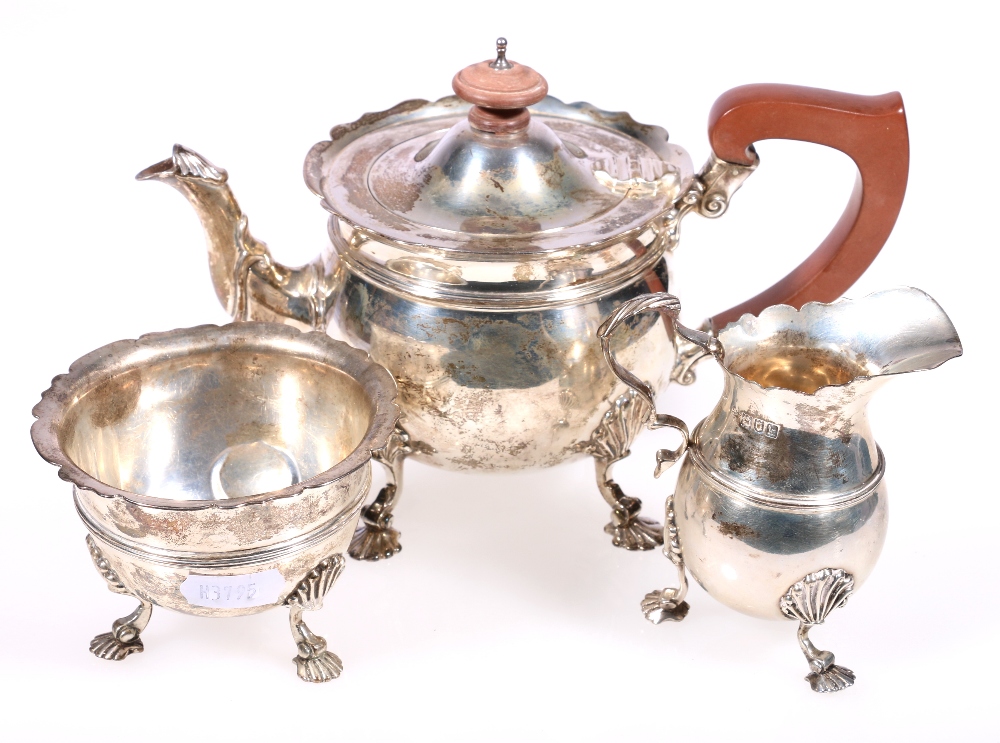 Edward VII silver batchelors three-piece teaset, raised on shell supports, London 1905,