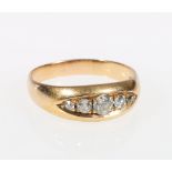 Gents 18ct gold five stone diamond ring, size S1/2, 5.