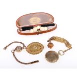 9ct gold ladies wristwatch, 12g gross, 9ct gold mounted cigarette holder in a fitted case,