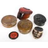 Five snuff boxes, two in the form of hooves, largest 11cm and three pressed horn snuff boxes,