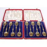 Two cases of six silver gilt commemorative mote spoons, Birmingham 1936, 135g, 11cm.