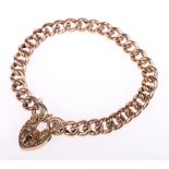 9ct gold curb link bracelet with padlock clasp, 16.