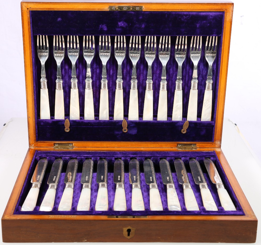 Edward VII set of twelve mother of pearl handled fruit knives and forks, cased,