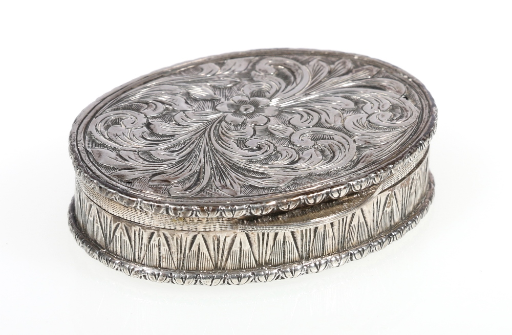 French silver oval pill box, engraved with scrolling foliage, hallmarked, 21g, 4.5cm.